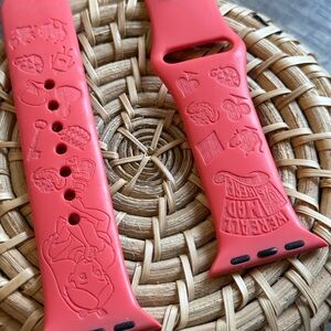 Like New! Alice in Wonderland Engraved Apple Watch Band.
Beautiful pink color